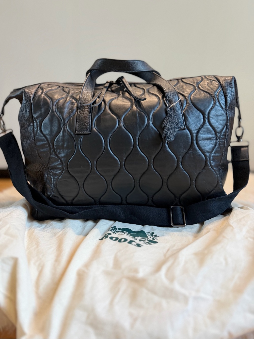 Roots Black Leather Duffel with dust bag